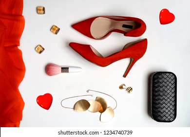 Top View To Valentines Day Party Outfit Composition Red Shoes Accessories Jewelry Clutch Two Hearts On White Background. Party Date Night Conception. Flat Lay, Copy Space