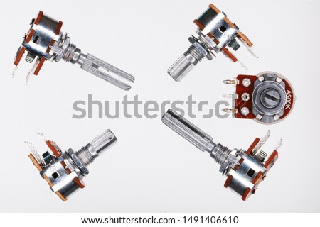 top view Variable resistor.Macro picture adjustable rotary potentiometer isolated on a white background