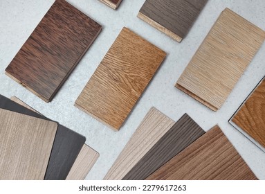 top view variety of wood texture for furniture and flooring furnishing material samples. interior material design samples. laminated, veneer, engineering wood flooring, wooden vinyl tile samples. - Shutterstock ID 2279617263