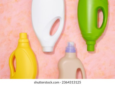 Top view of various bottles of liquid detergents to keep clothes clean and fresh. - Shutterstock ID 2364313125