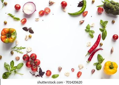 top view of various fresh vegetables and herbs isolated on white - Shutterstock ID 701420620