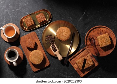 Top View Various Shape Moon Cake (Mooncake) Chinese Dessert Snack During Lunar New Year Mid Autumn Festival. Concept Rustica Black Asian Bakery, Served With Tea And Coffee. Copy Space