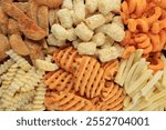 Top View Various Shape and Texture of Frozen French Fries on Supermarket 