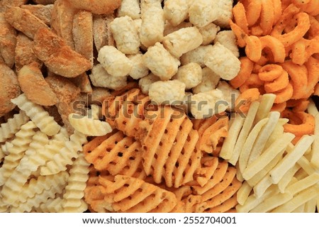 Top View Various Shape and Texture of Frozen French Fries on Supermarket 