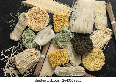 Top View Various Type Raw Asian Dry Noodle, Soba, Ramen, Ramyeon, Misua, Char Kway Teow, Vegetable Egg Noodle, Somen. On Black Marble Table 