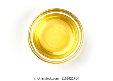 Top View Of Vegetable Or Olive Oil In A Bowl, Isolated On White Background