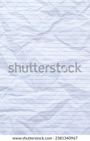 Top view vertical empty rumpled lined paper with wrinkled. Notebook lined paper background and texture.
