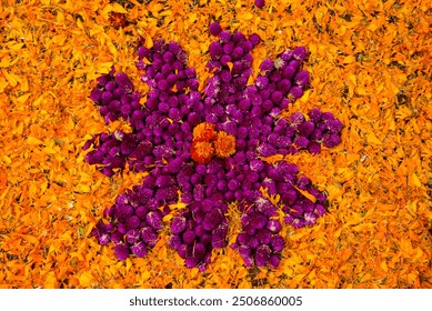 Top view of a vibrant flower carpet made with marigold and purple flowers, traditionally created for Day of the Dead celebrations in Mexico - Powered by Shutterstock