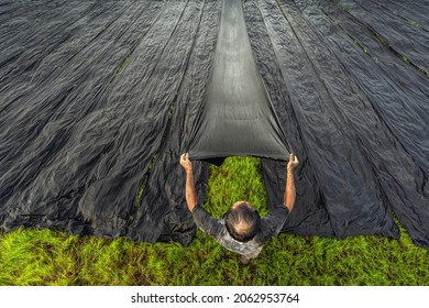 Top View Vietnamese Worker Dry Clothes In The Sun When Sunrise In Tan Chau Village, Angian, Vietnam, Latest Village Of Ancient Culture To Dyed, Tradition And Conserve Culture Concept