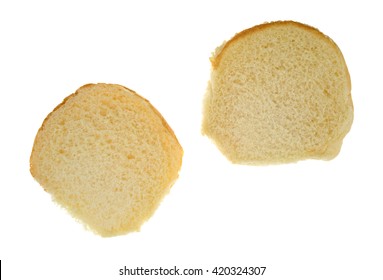 Top View Of A White Bread Sesame Seed Hamburger Bun Open Isolated On A White Background.