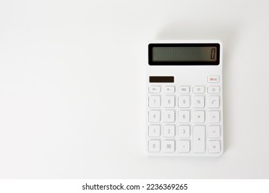 Top view of white calculator isolated on white background. - Shutterstock ID 2236369265