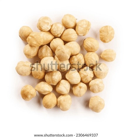 top view of white hazelnuts isolated with clipping path on a white background