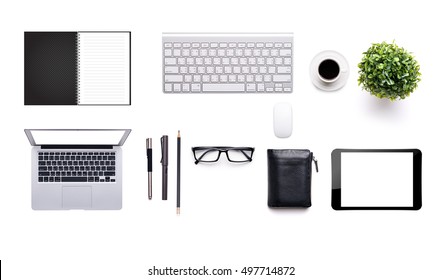 top view of White office desk table with a lot of things on it. - Shutterstock ID 497714872