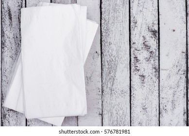 Top View White Paper Napkins, Tissue On Wooden Table Surface, Copy Space