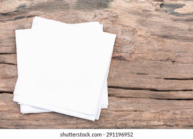 Top View White Tissue Paper On Wooden Table