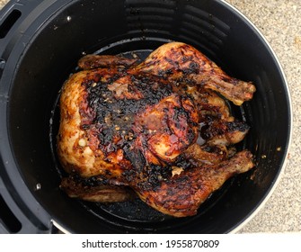 Top View Of Whole Chicken Roasted In Air Fryer. Healthy Cooking