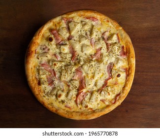 Top View Of Whole Pizza Of Pork Loin With Cream Cheese And Pineapple Or Lombo Ao Creme Com Abacaxi.