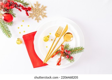 top view of the winter festive table with serving in the classic style of celebrating the New Year. Christmas decorations . background layout - Shutterstock ID 2206468205