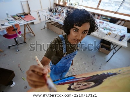 Top view of woman, art or canvas painting in studio workshop with oil paint, paintbrush or innovation vision. Creative artist, painter or designer with ideas for Indian art gallery exhibition or expo