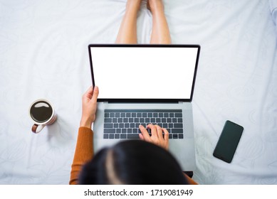 Top View Woman With Blank Screen Of Laptop While Shopping At Home Or Work From Home WFH Concept.