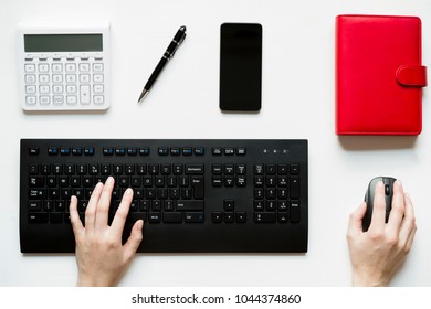 Top View, Woman Sitting At Desk And Working On Her Pc, Her Table Is Perfectly Tidy And Organized