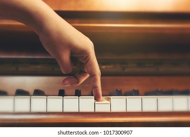 Top View Woman's Hand Playing And Practice Piano In Musicroom At School. Favorite Classical Music.Show Finger Walking On Piano Keyboard.