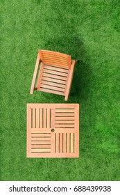 Top View Wood Table And Chair Table On Grass