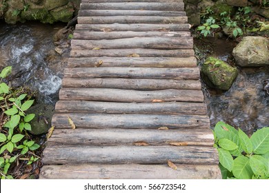 Top View Wooden Bridge Over Small River