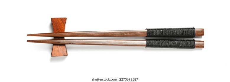 Top view of wooden chopsticks isolated on white background, Suitable for Mockup creative graphic design