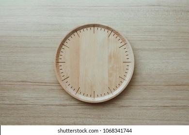 Top View Of Wooden Clock With Out Watch Hands, Time No Time Concept, Wooden Desk Space To Put Copy Wording, Creating Your Time With Unless Time Concept