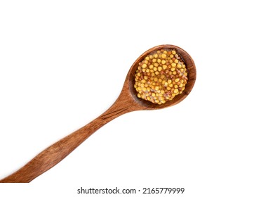 Top View Of Wooden Spoon With Dijon Mustard Over White Background. Mustard Sauce With White And Black Mustard Seeds. Copy Space.