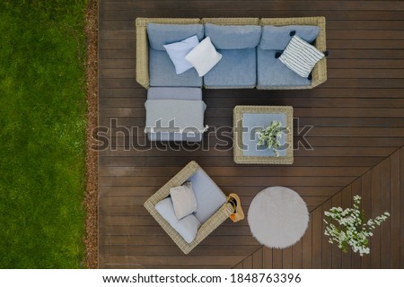 Similar – View of a garden through a fly screen