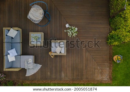 Similar – View of a garden through a fly screen