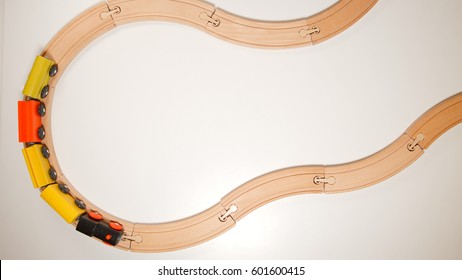 TOP VIEW: Wooden Toy Train On Curve Wooden Railways