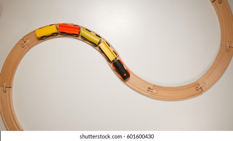 TOP VIEW: Wooden Toy Train On Curve Wooden Railways