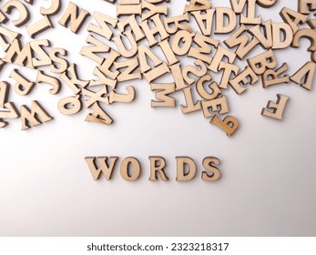 Top view wooden word with the word WORDS on a white background. - Shutterstock ID 2323218317