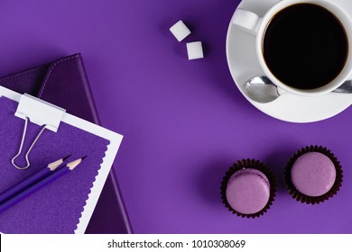 Top View Of Workspace With Coffe Cup And Cupcakes