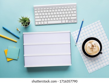 Top View Of Worktable With Cinema Light Box And Accessories.Business Flat Lay Background.start A Day.copy Space