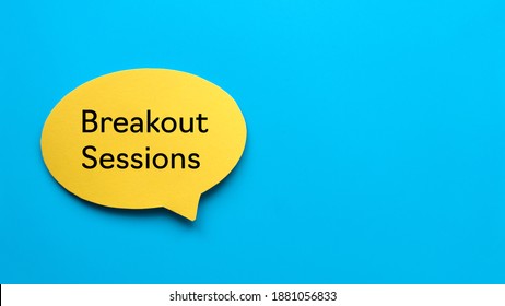 Top view of yellow speech bubble written with Breakout Sessions on blue background with copy space. - Shutterstock ID 1881056833