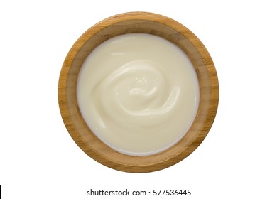 Top View Of Yogurt In Wooden Bowl Isolated On White With Clipping Path