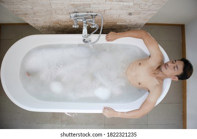 Top View Young Asian Man Relax And Spa In Bathtub