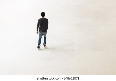 Top View Young Asian Man Enjoy With Playing Ice Skate At Rink. Space For Text. 