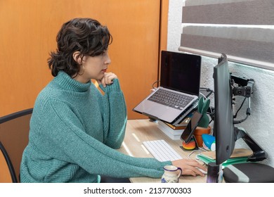 Top View Of Young Latina Woman Working At Her Desk At Home With Her Computer. Home Office Concept.