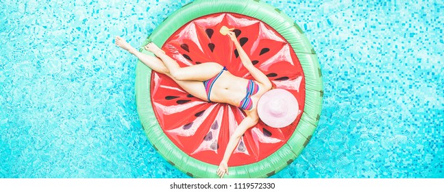 Top View Of Young Woman Relaxing On Watermelon Lilo In Villa Resort Pool - Rich Girl Floating With Fruit Mattress Drinking Tropical Cocktail - Summer Holiday, Luxury Lifestyle And Fashion Concept