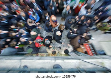 Top View Zoom Burst Shot Of A Rallying Politician Shaking Hands In A Crowd