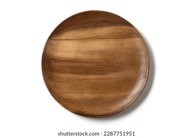 Top view,Antique wooden plate With beautiful patterns, plate food or coffee isolated on white background.