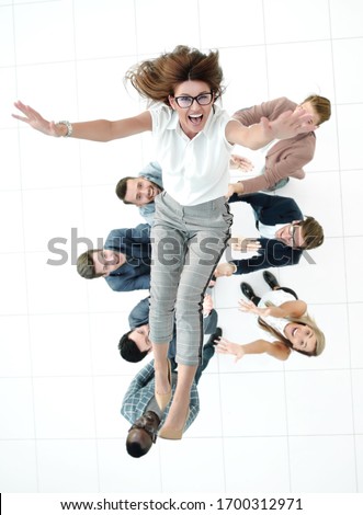 top view.colleagues throws the project Manager
