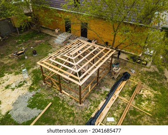 Top View.construction Site. The Skeleton Of The Gazebo Is Made Of Wooden Beams.