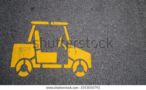 Top - view,Yellow car symbol on\
the street in Urban city. transportation\
concept