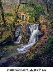 AT THE TOP OF THE WATERFALL